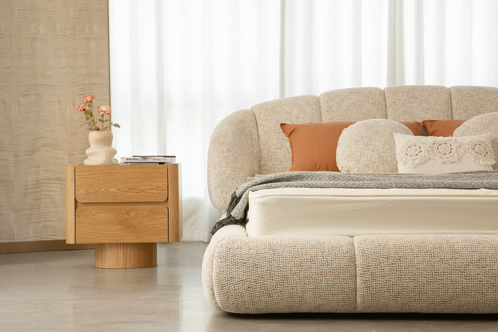 Modern & Comfortable Bed Furniture at Adwin Candy Bed showcasing low-profile segmented base, rounded edges, and textured beige fabric for ultimate relaxation and style