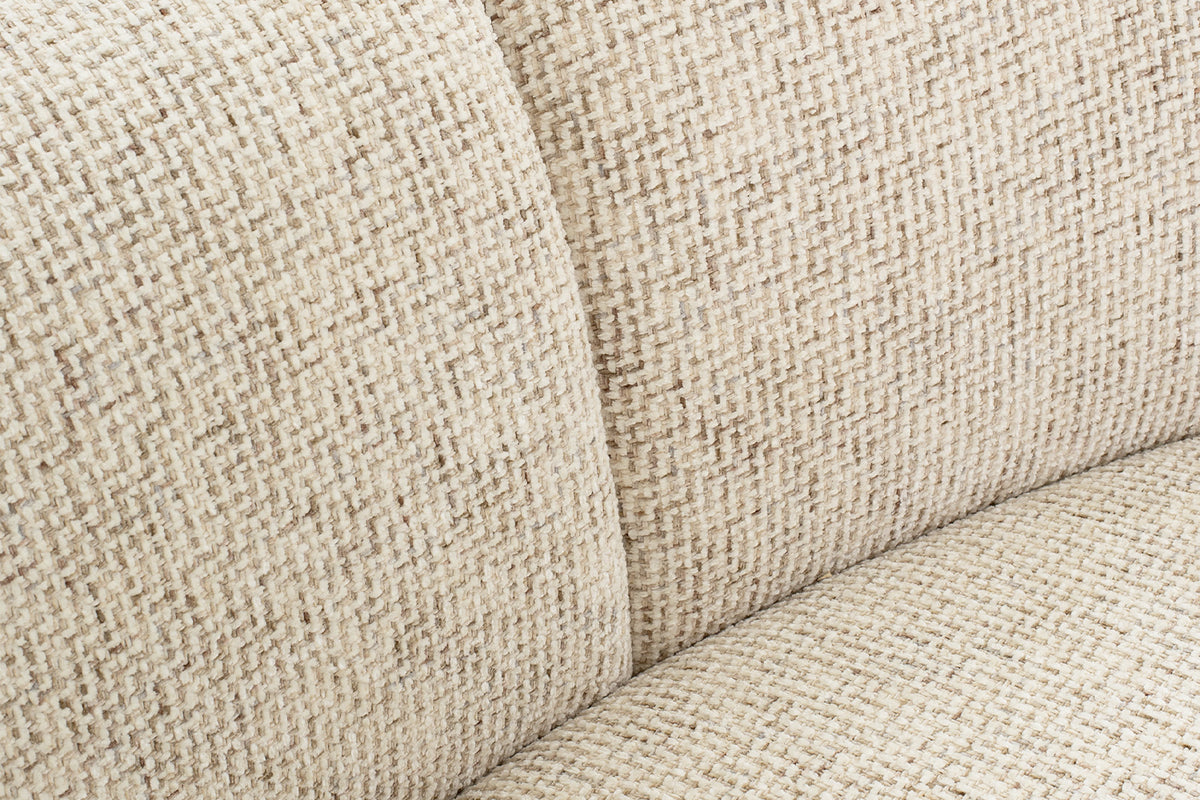 Close-up of soft boucle texture and channels on Candy 3-seater curved sofa