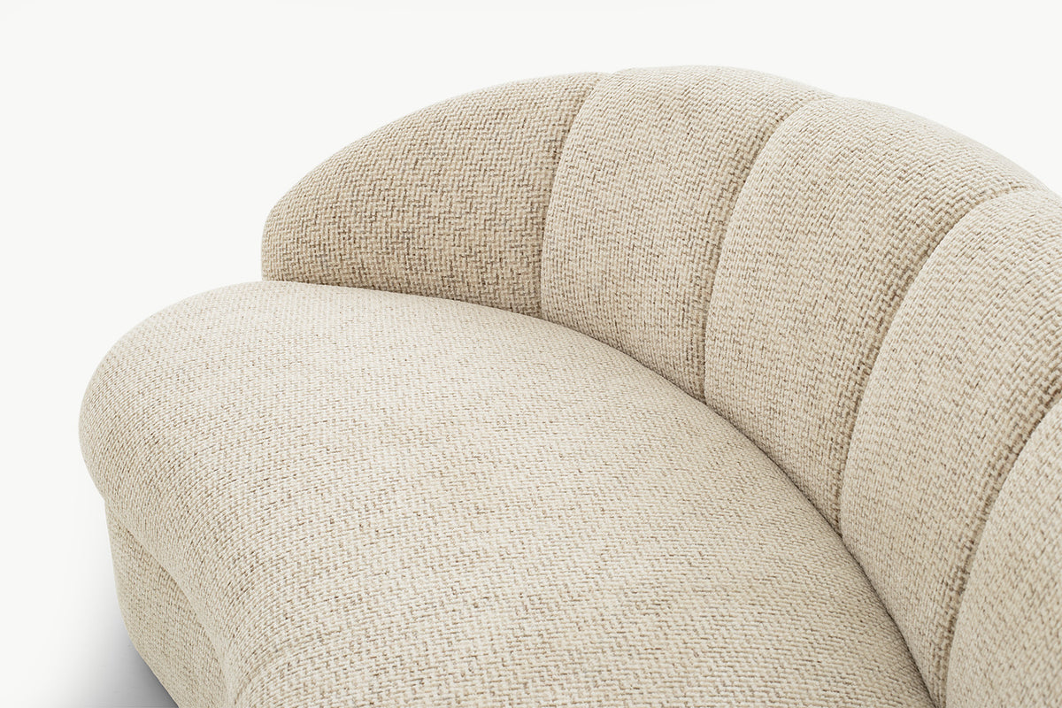 Rounded arm and plush cushion detail on neutral Candy 3-seater boucle sofa