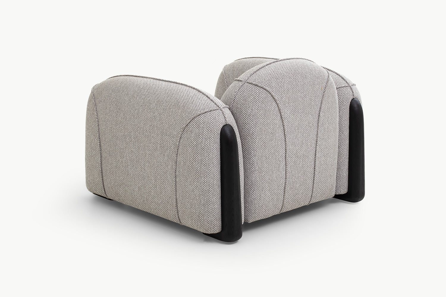 Side view of Chirs Sofa 1-seater boucle with scalloped back and dark wood base