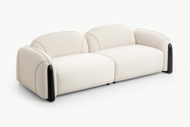Chirs 3-seater curved boucle sofa in beige cozy fabric with scalloped back and black arms