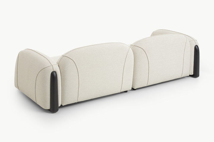 Close-up scalloped channel tufting on beige boucle backrest of Chirs 3-seater sofa