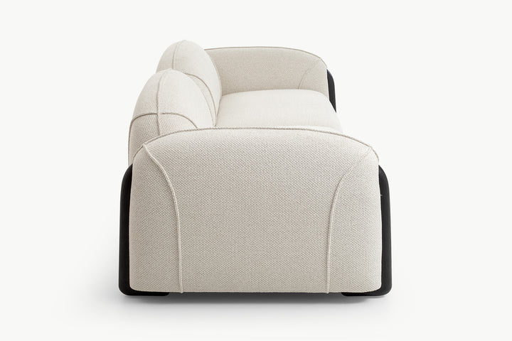 Rounded arm and textured boucle detail on cozy Chirs 3-seater sofa with black accent