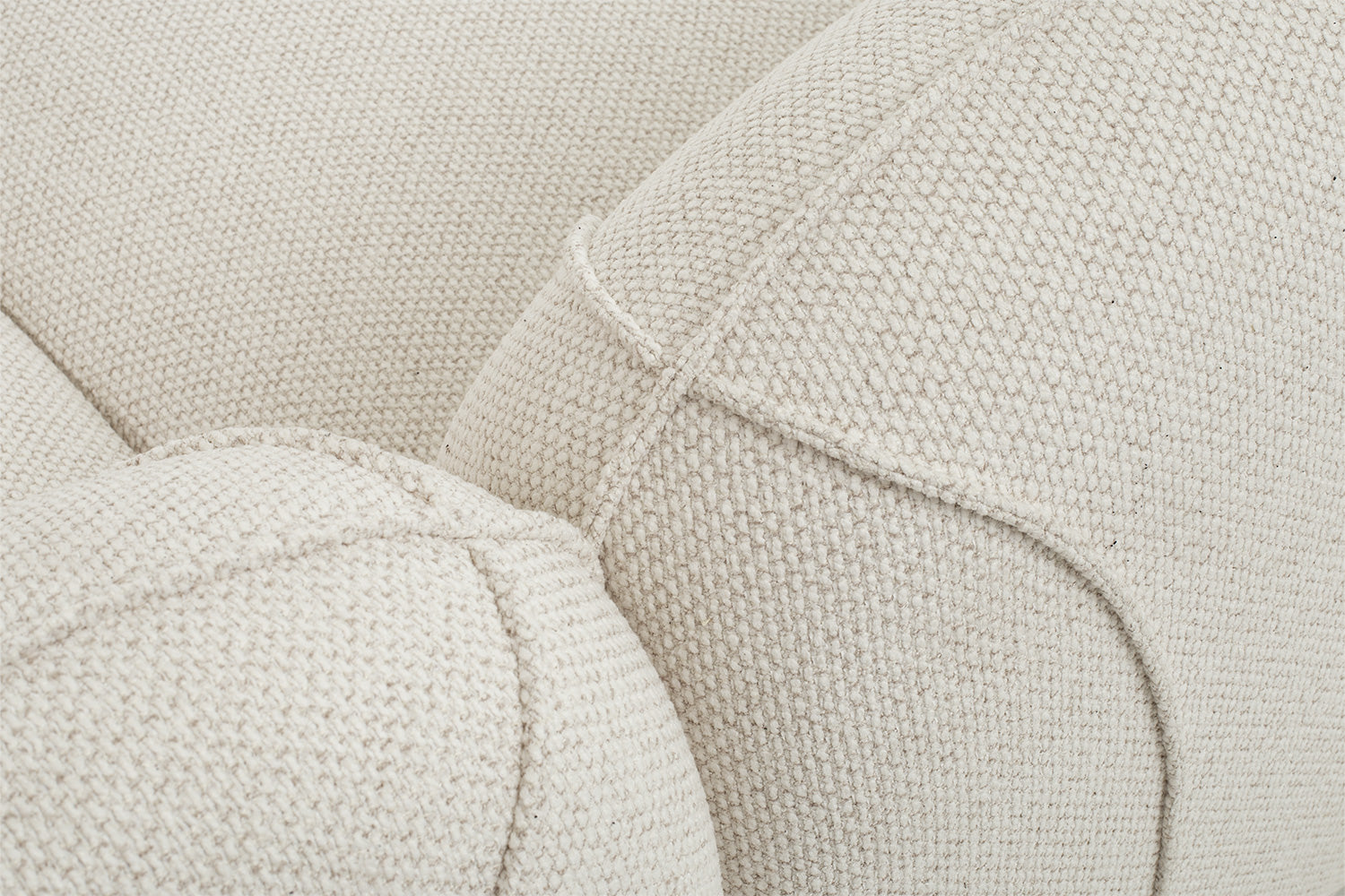 Plush cushion and boucle fabric texture detail on durable Chirs 3-seater cozy sofa