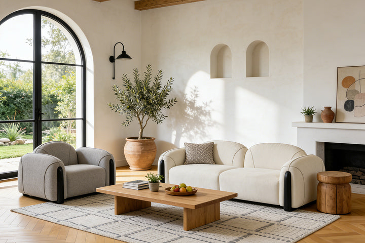 Cozy beige boucle Chirs 3-seater sofa in warm neutral living room with arched niches and plants