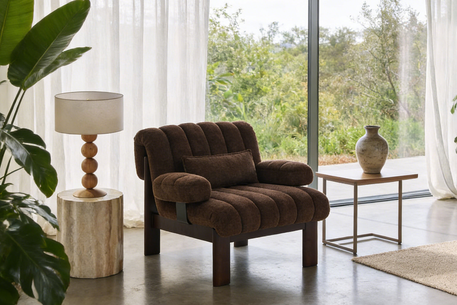 Coco Armchair cozy armchair in sunlit room, deep comforting embrace, tactile boucle luxury, effortless relaxation