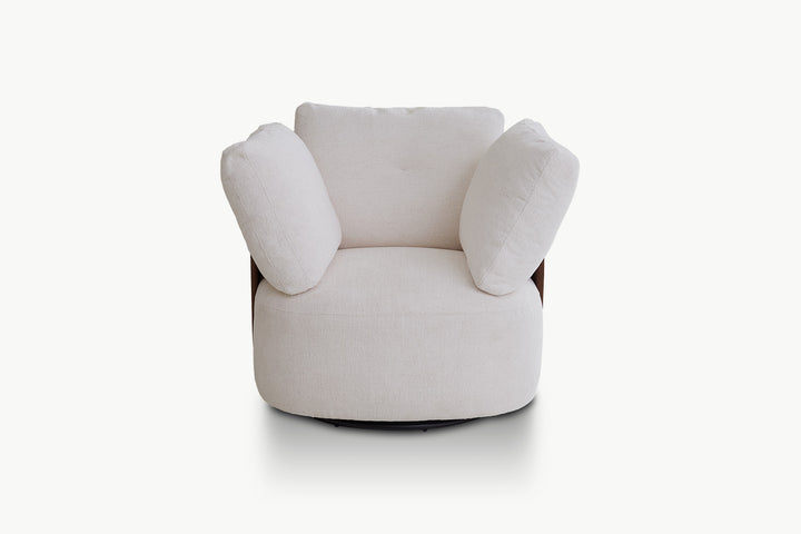 Rear view of modern swivel accent chair showing elegant walnut wood curved armrests and thick padded back pillows in neutral cream tone
