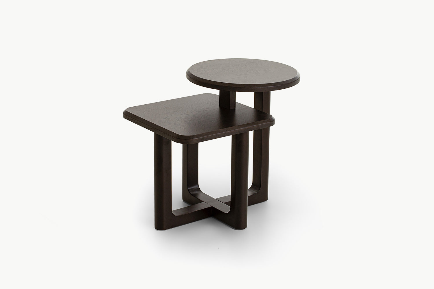 Modern nested side table in rich dark walnut finish with round upper tier and square lower shelf, featuring architectural open-frame base