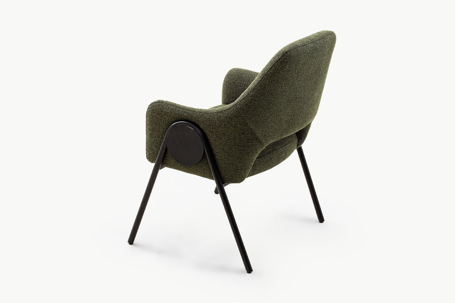 Angled shot of the olive dining chair with luxurious olive green textured fabric enveloping the ergonomic shell shape and black powder-coated metal legs, combining durability with luxurious appeal.
Name: 