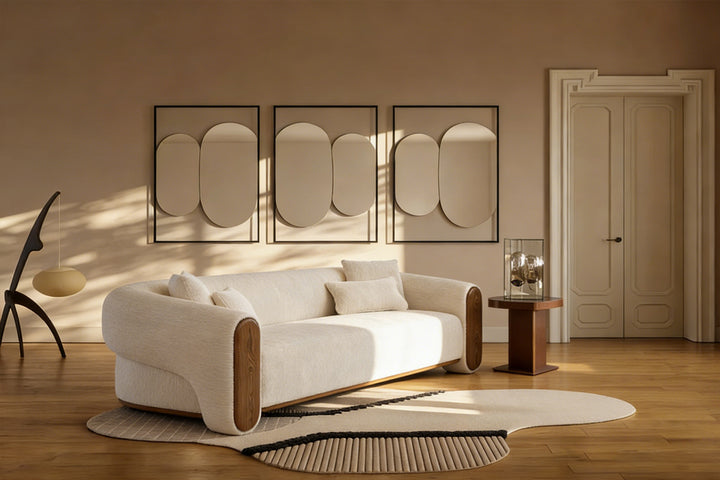 Ruth 3-seater family-friendly sofa styled as living room seating furniture with abstract art